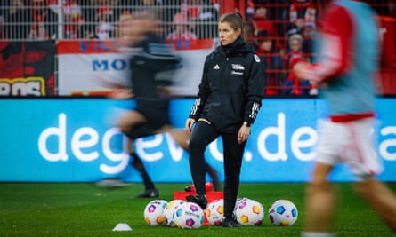 Marie-Louise Eta looks on during the warm-up before Union Berlin face Augsburg