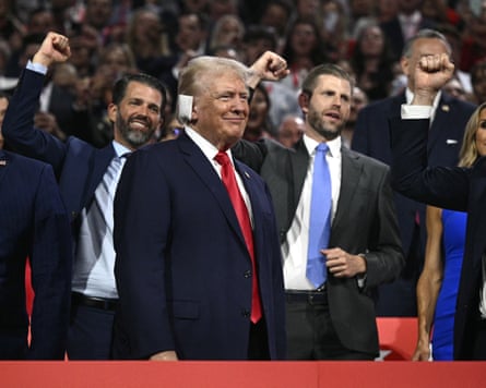 Donald Trump with his children in the background