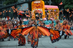 People take part in the Day of the Dead parade in Mexico City
