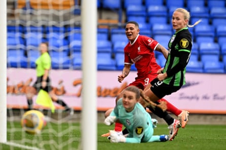 Shanice van De Sanden scores Liverpool’s second goal in the win over Brighton.