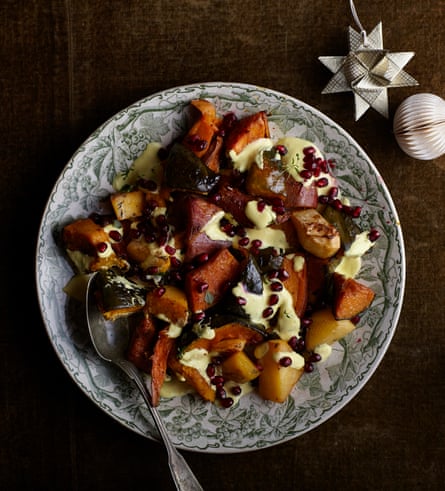 Signe Johansen’s midwinter sunset roast of swede, pumpkin and sweet potato with saffron lemon yoghurt and pomegranate seeds.