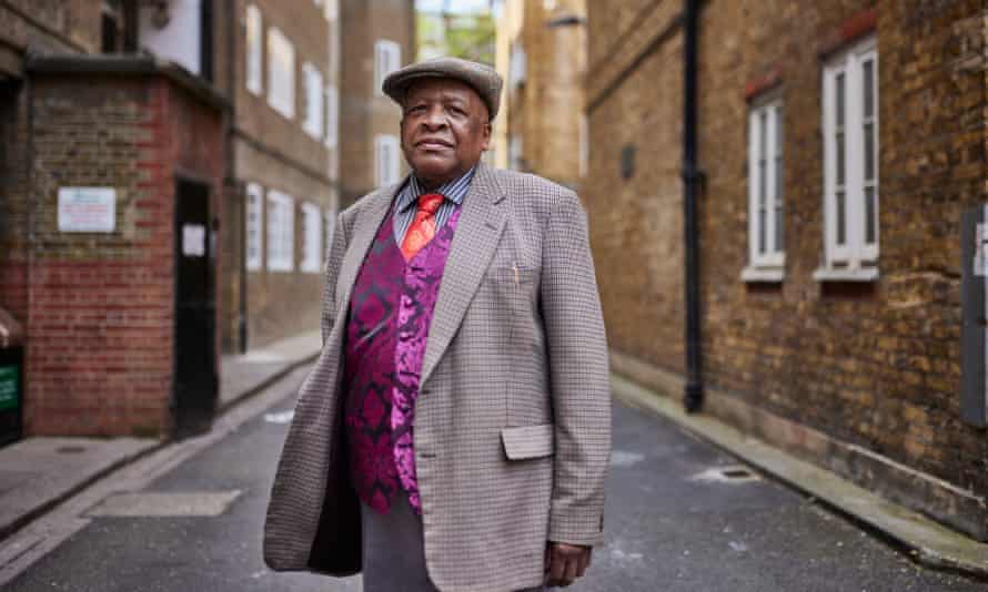 One of the Maida Hill domino players, Ernest Theophile, has been brought to court for being too loud.