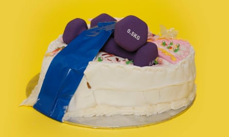 Hand weights taped to a cake