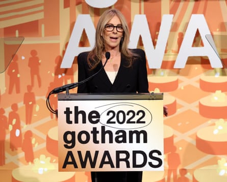 Kathryn Bigelow speaks on stage with a sign saying ‘the 2022 Gotham awards’.
