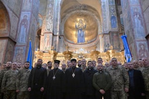 Soldiers standing in an ornate church