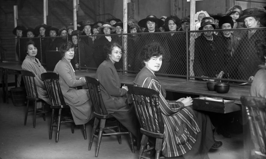 Women queue for unemployment benefit in 1919.