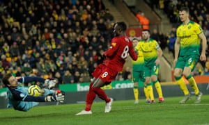 Norwich City keeper Tim Krul dives to save a shot from Naby Keita..
