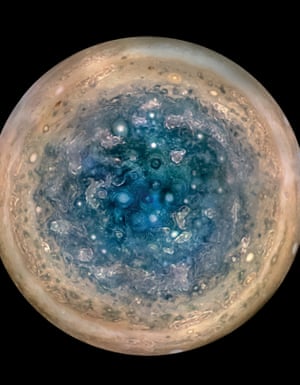 Jupiter’s south pole, as seen by the Juno spacecraft from an altitude of 32,000 miles (52,000 kilometers). The oval features are cyclones, up to 600 miles (1,000 kilometers) in diameter. Multiple images taken with the JunoCam instrument on three separate orbits were combined to show all areas in daylight, enhanced colour, and stereographic projection.