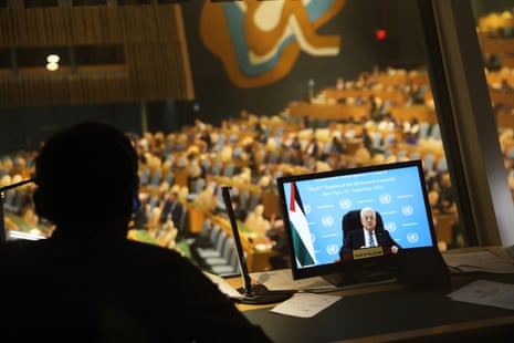 A hidden figure watched Mahmoud Abbas on a screen at the UN general assembly.