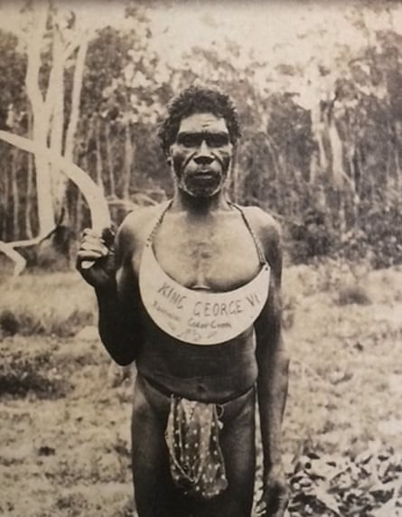 A photo of an Indigenous man with a ‘king plate’ around his neck