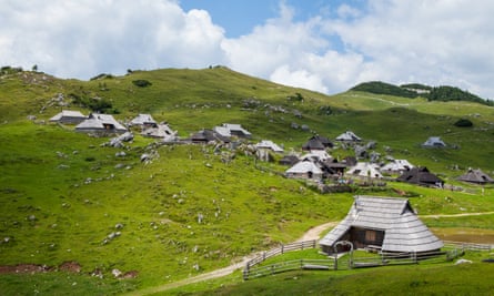 Green hills and cottages in Velika Planina, SloveniaHills on Velika Planina, Slovenia, summer time