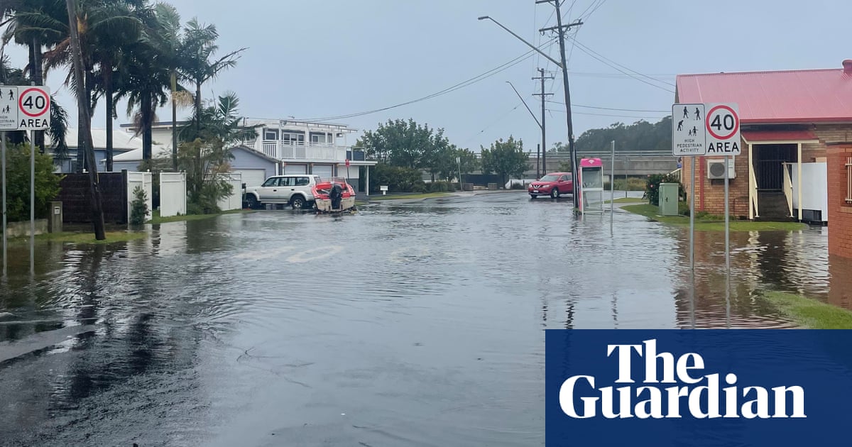 Floods, wild winds and power cuts: inundated NSW south coast holiday haven braces for more heavy rain | Australia weather Floods, wild winds and power cuts: inundated NSW south coast holiday haven braces for more heavy rain | Australia weather