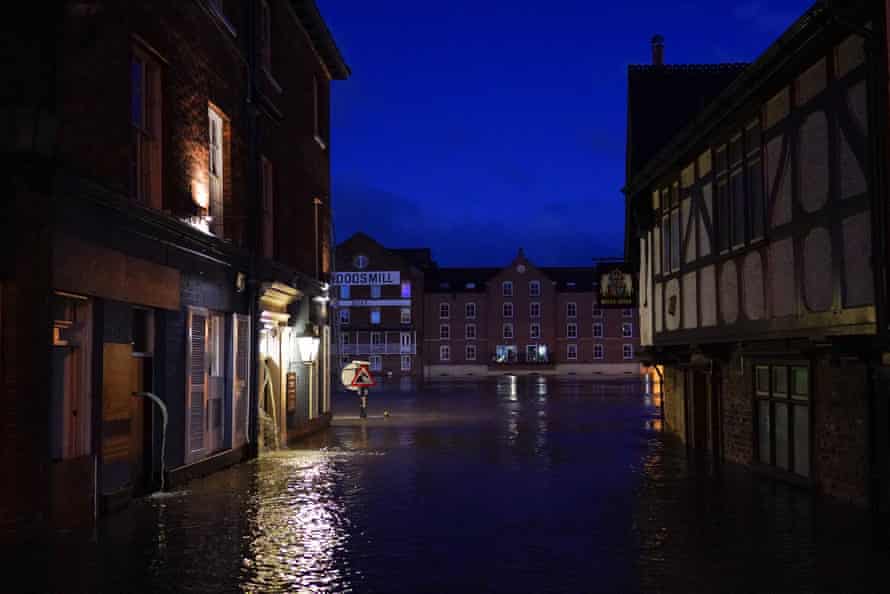 The River Ouse in York floods as rain and recent melting snow raise river levels