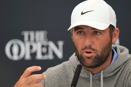 Scottie Scheffler gestures as he speaks during a press conference before the Open at Portrush.