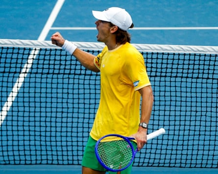 Alex de Minaur celebrates during the Davis Cup match between Australia and Poland in Brisbane