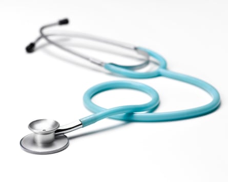 Blue stethoscope on white background with copy space.