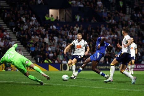 Thierno Barry tucks the ball past Preston’s keeper Lee Nicholls to give Everton the lead.