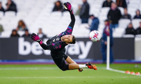 Lukasz Fabianski of West Ham United in action during the warm up before the match against Liverpool.