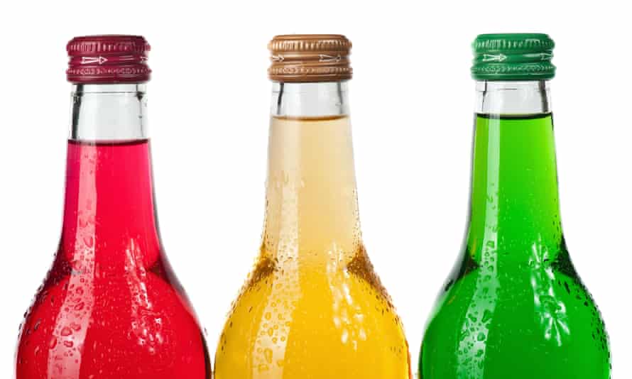 Assortment of cold bottles of pop