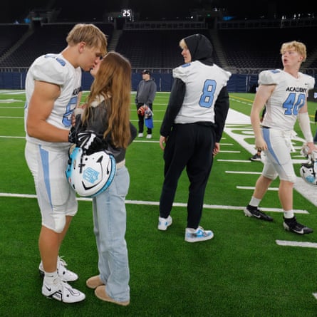 Felician Weissensel, a defensive lineman from Austria for the NFL Academy, is greeted by his girlfriend straight after the match against De La Salle Spartan.