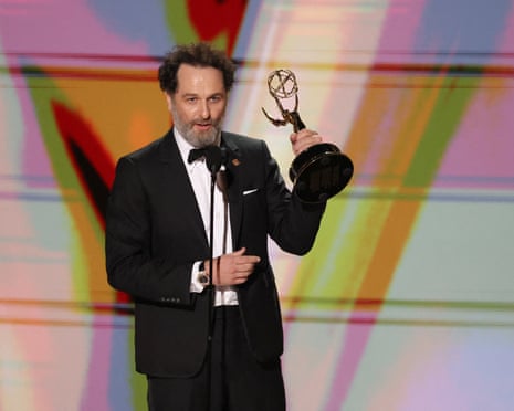 Matthew Rhys accepts his award