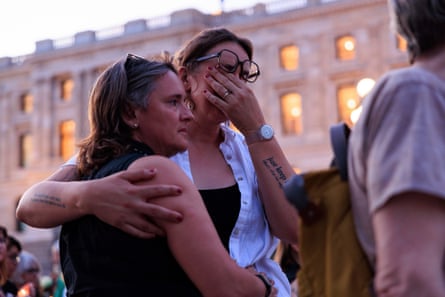 two people embrace