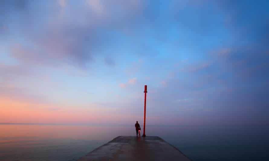 Red sky in the morning … Roff Smith and his bike before sunrise.