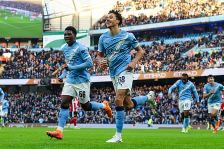 Max Alleyne wheels away after opening the scoring against Exeter at the Etihad Stadium