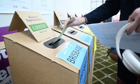 A person casts their vote at a polling booth on May 21, 2022 in Brisbane, Australia. 