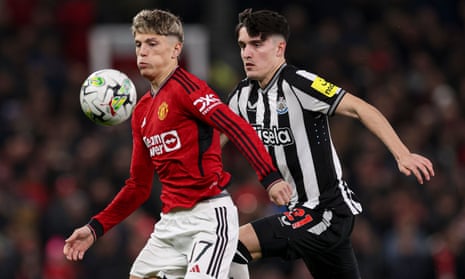 Alejandro Garnacho of Manchester United shields the ball from Tino Livramento of Newcastle United.