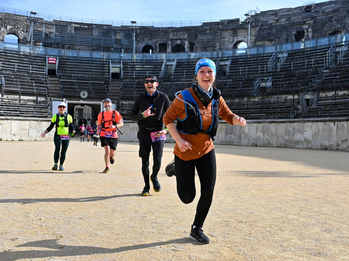 We burst into the arena feeling like warriors': urban trail racing in Nîmes  | Running holidays | The Guardian