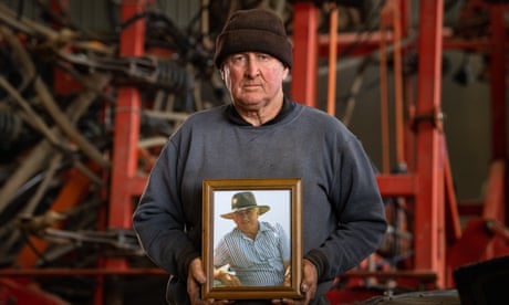 Grain grower Wayne Prosser holds a photo of his late father Ronald ‘Rusty’ Prosser