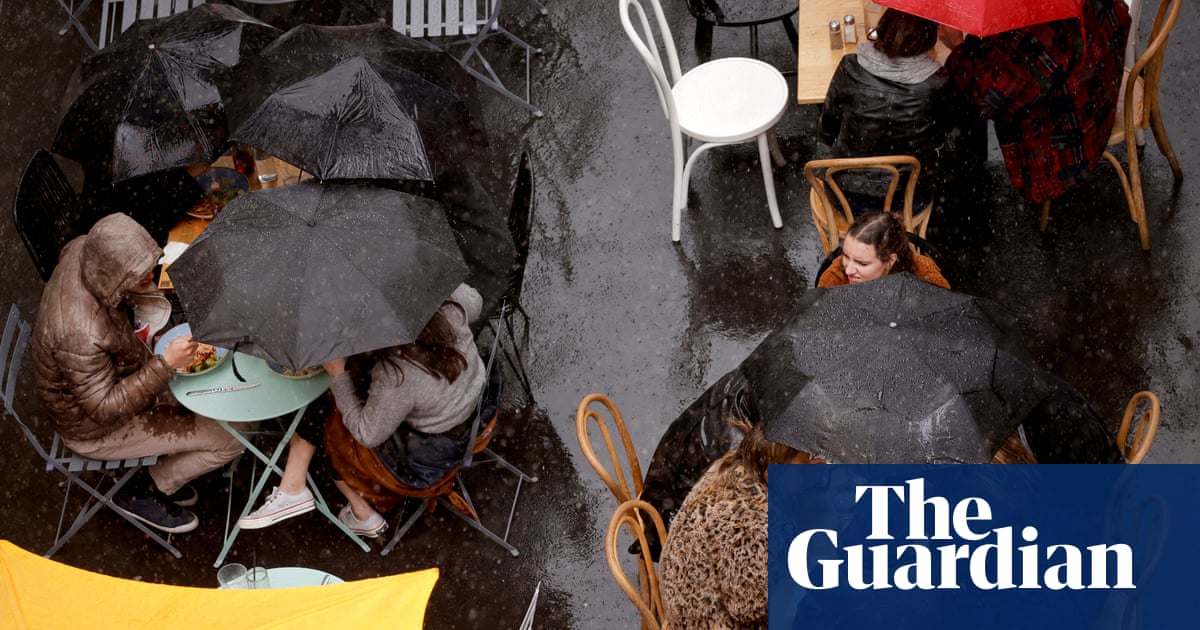 Rain falls on France’s outdoor terraces as Covid restrictions ease