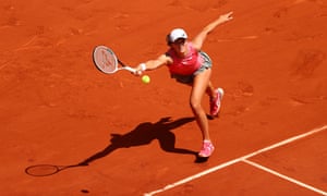 Iga Swiatek of Poland hits a forehand.