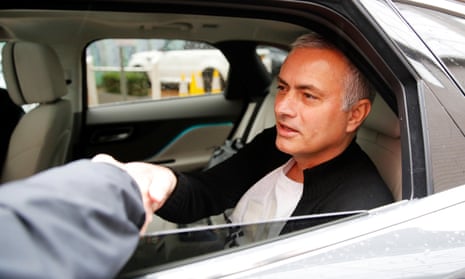 José Mourinho leaves the Lowry Hotel, presumably with his big plate in tow.