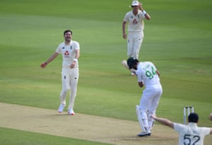 England’s James Anderson celebrates taking the wicket of Pakistan’s Shan Masood.