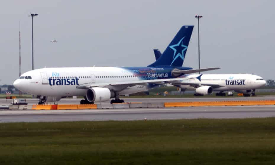 Air Transat jets prepare to take off at at Montréal Pierre Elliott Trudeau international airport in Canada. Air Canada has reached a deal to buy Transat for C$520m.