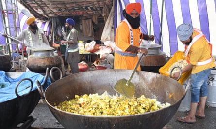 Make-up shift community cooks food for protesting farmers on Delhi-Haryana border in Sanghu