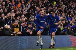 Chelsea’s Marcos Alonso, left, is congratulated by fellow goalscorer Alvaro Morata after scoring their second goal in their 2-0 win over Brighton and Hove Albion