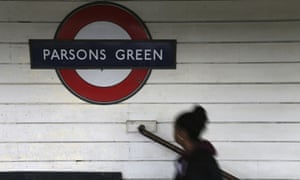 A passenger walks onto the platform at Parsons Green station after it was reopened following the terrorist attack