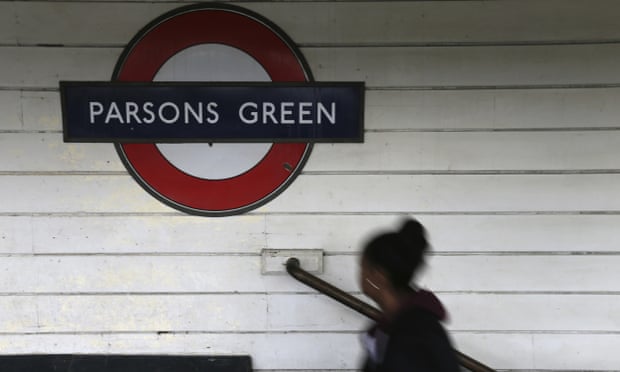 A passenger walks onto the platform at Parsons Green station after it was reopened following the terrorist attack