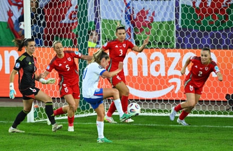 Ella Toone scores England’s second goal against Wales in a widely expected demolition job that sealed their place in the knockout stages.