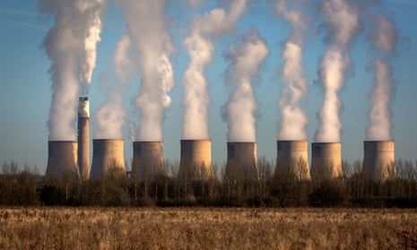 Water vapour rises from the cooling towers of Ratcliffe-on-Soar power station