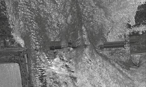 A satellite image shows a close-up view of flooding in Nova Kakhovka dam and hydroelectric power facility, in Nova Kakhovka, Ukraine, 6 June 2023.