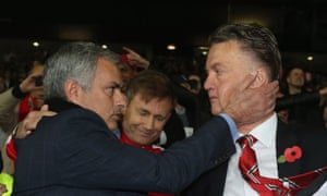 Jose Mourinho embraces Louis van Gaal after Chelsea’s match at Manchester United in October 2014