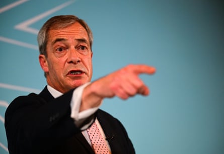 Nigel Farage pointing his finger on a platform