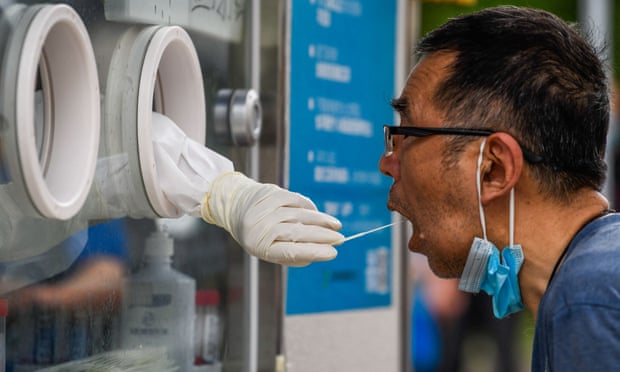 A man is tested for Covid in Shanghai's Huangpu district