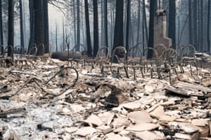 The frames of chairs and the chimney are the only things left at the Grizzly Flats community church.