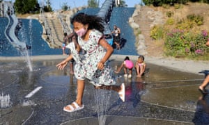 Obama says Trump violated ‘core tenet’ of democracy with election ‘hooey’ – as it happened - The Guardian 3 Isis Macadaeg, age 7, plays in a spray park at Jefferson Park during a heat wave in Seattle, Washington.
