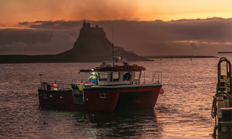A fishing boat is seen returning in Lindisfarne, which has been dropped from becoming one of the new HPMAs.